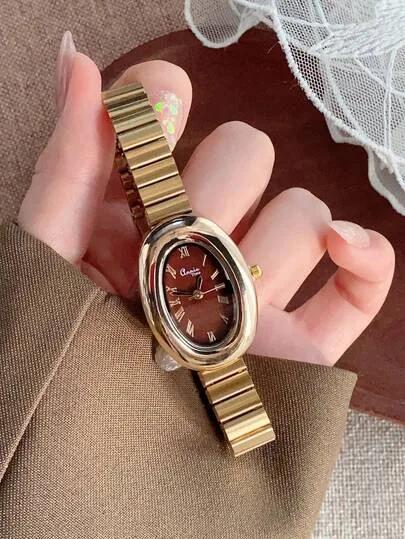 ساعەتی ئاسایی ژنانە بە چوارچێوەی زیمی-ڕەش و ڕووپۆشی زێڕینی، گونجاو بۆ ئاسایی ڕۆژانە، یەک پارچە